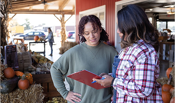 women in barn