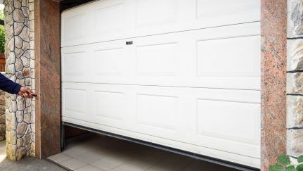 A lit gas stove with a blue flame.