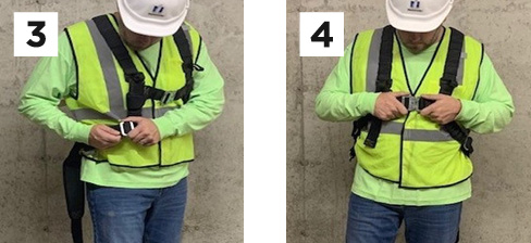construction worker demonstrating steps 3 and 4 of wearing a safety harness