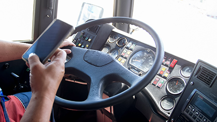 truck driver distracted by phone while driving