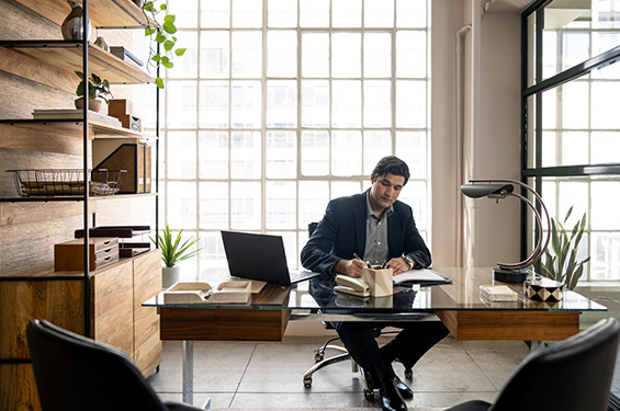 Financial professional working at desk