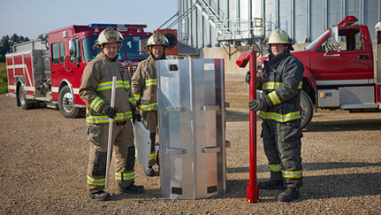 Fire fighters with grain rescue tube
