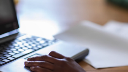 person typing on a computer