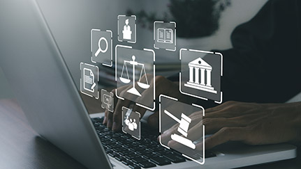 Legal icons and a laptop computer.