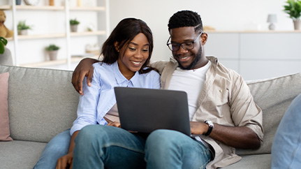 couple looking at computer