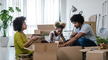 Couple packing boxes