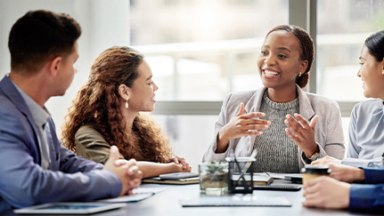couple meeting with a financial advisor in his office
