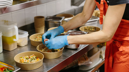 people inspecting products in a factory