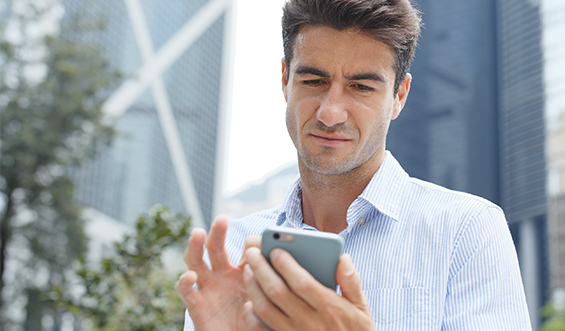 A person looking at their mobile device.