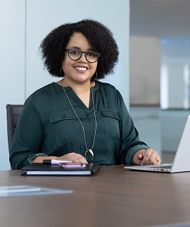 Nationwide Underwriting Senior Analyst Justine Hope looks up from her laptop and smiles.
