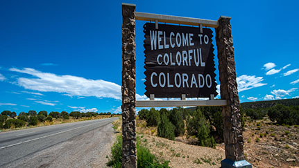 Welcome to colorful Colorado road sign