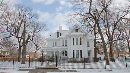 exterior of a home with snow on the ground