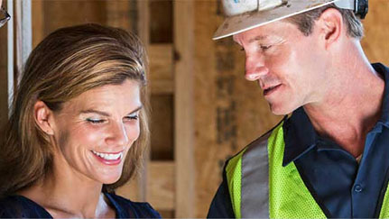 woman speaking with contractor