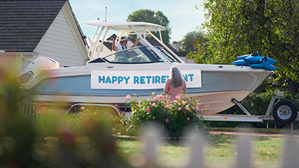 red and white speedboat on red trailer