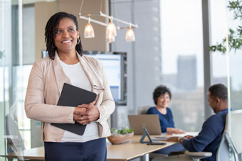 Employees talking in a conference room